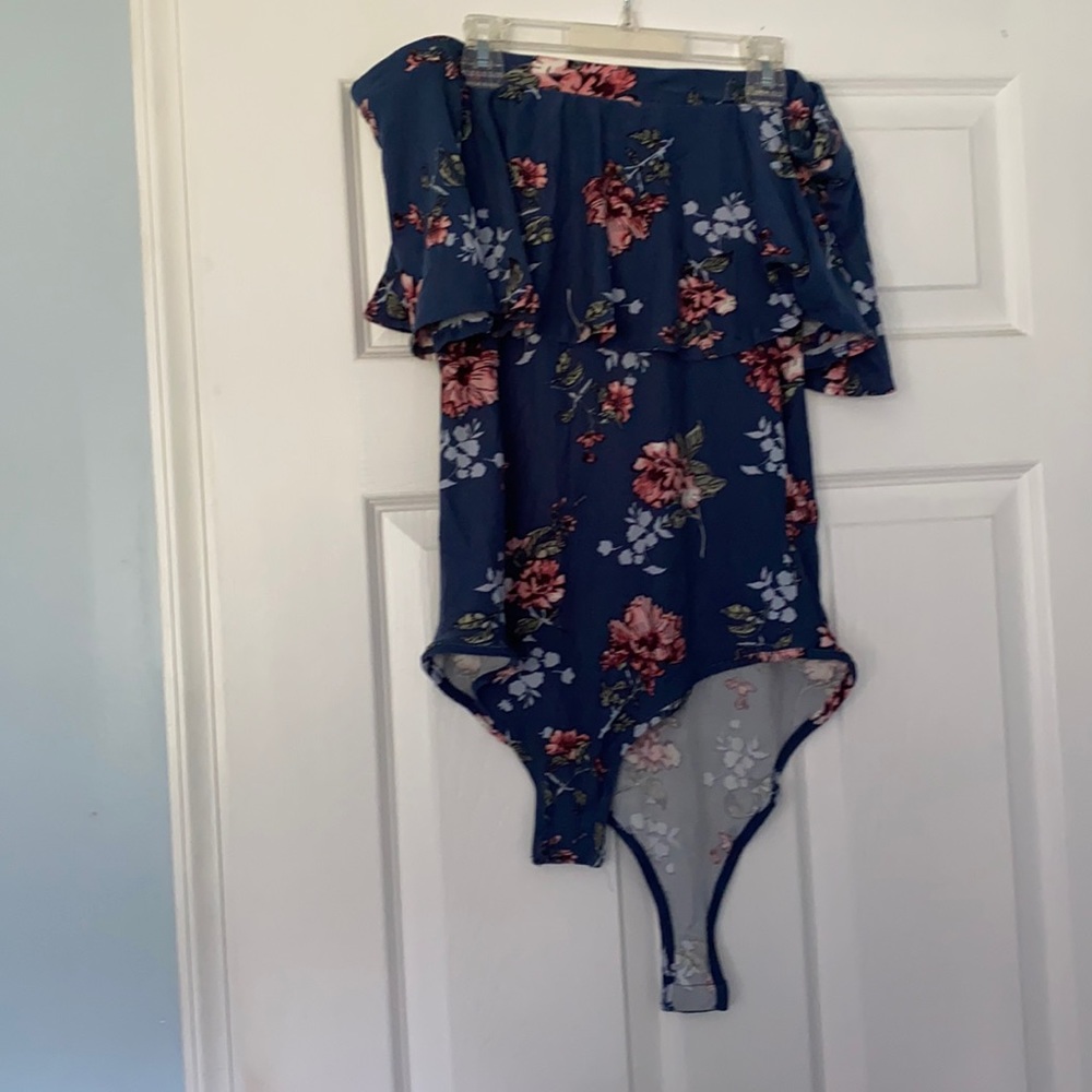 Rue 21  patterned body suit. Size large.